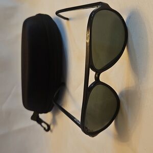 Ray-Ban RB4125 Cats 5000 Classic sunglasses with a polished black frame and grey